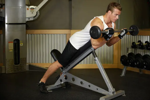 Barbell Curls Lying Against An Incline, finishing position