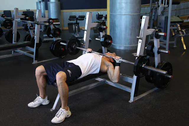 Barbell Guillotine Bench Press, finishing position