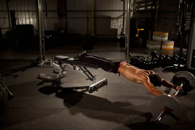 Barbell Rollout from Bench, finishing position