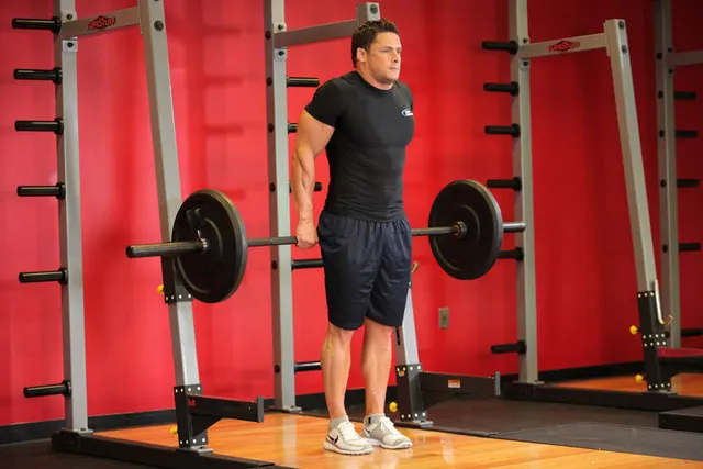 Barbell Shrug Behind The Back, finishing position