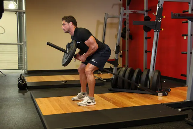 Bent Over Two-Arm Long Bar Row, finishing position