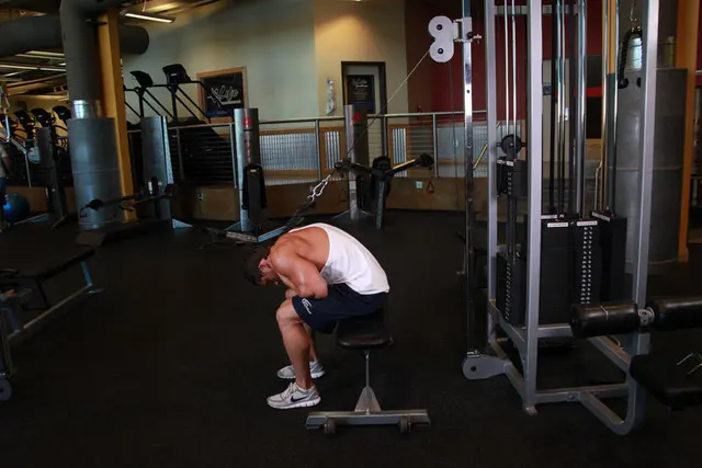 Cable Seated Crunch, finishing position