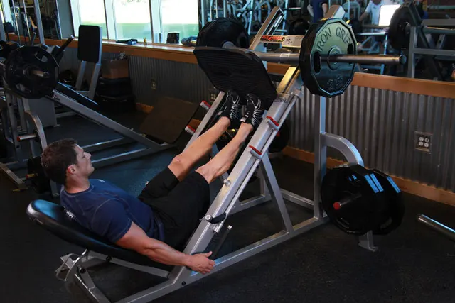 Calf Press On The Leg Press Machine, finishing position