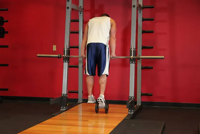 Calf Raise On A Dumbbell, finishing position