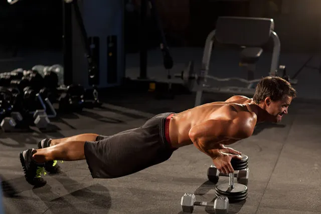 Close-Grip Push-Up off of a Dumbbell, finishing position