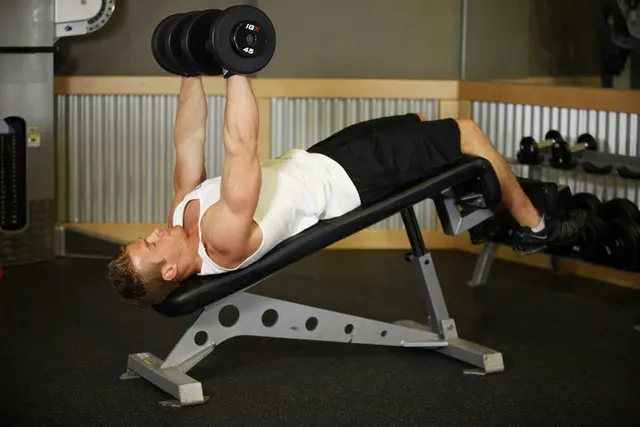 Decline Dumbbell Bench Press, finishing position
