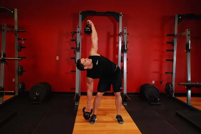 Double Kettlebell Windmill, finishing position