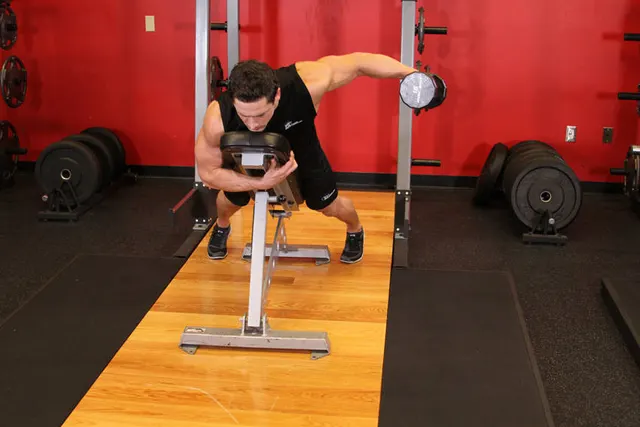 Dumbbell Lying One-Arm Rear Lateral Raise, finishing position
