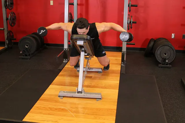 Dumbbell Lying Rear Lateral Raise, finishing position
