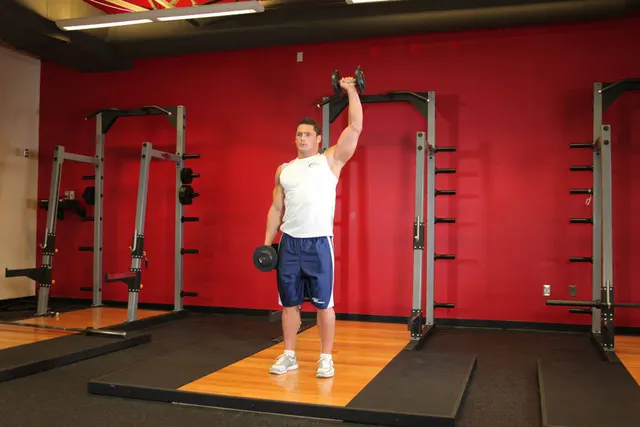 Dumbbell One-Arm Shoulder Press, finishing position