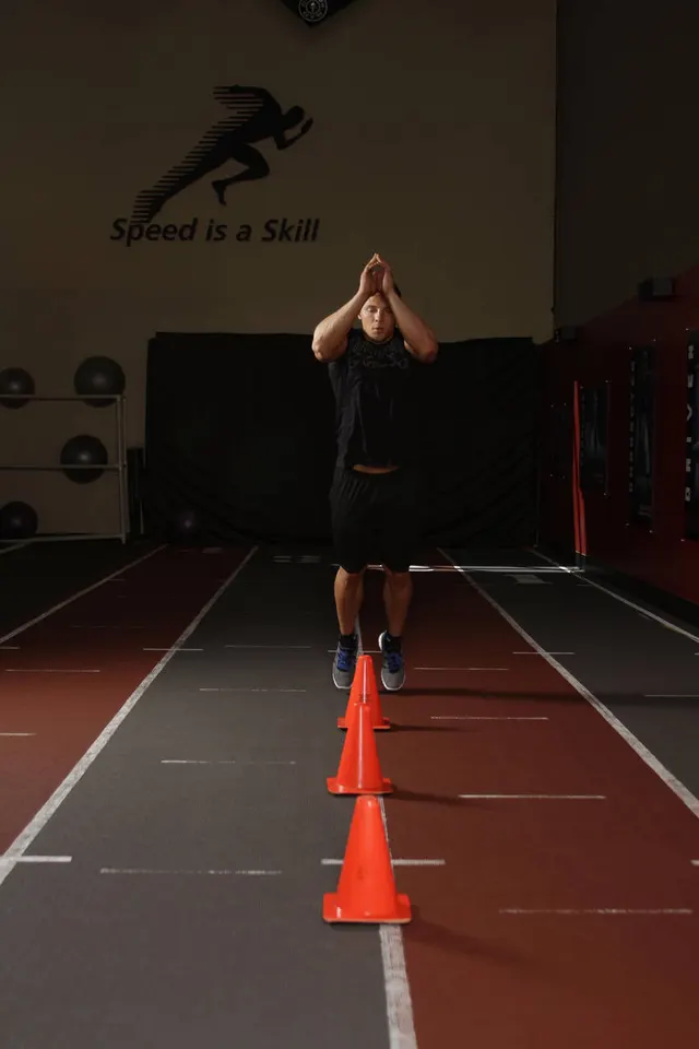 Front Cone Hops (or hurdle hops), starting position