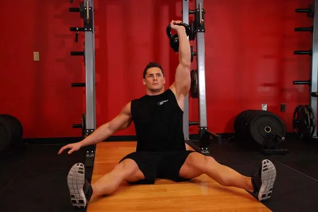 Kettlebell Seated Press, finishing position