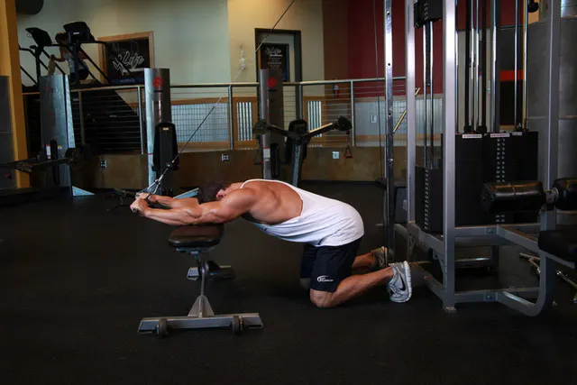 Kneeling Cable Triceps Extension, finishing position