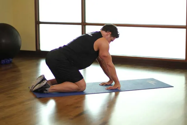 Kneeling Forearm Stretch, finishing position