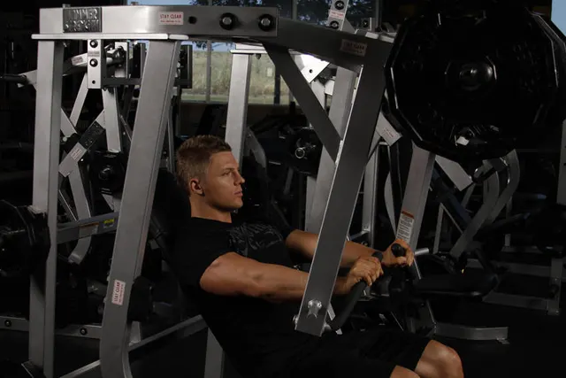 Leverage Decline Chest Press, finishing position