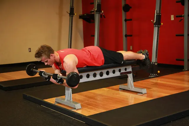 Lying High Bench Barbell Curl, finishing position