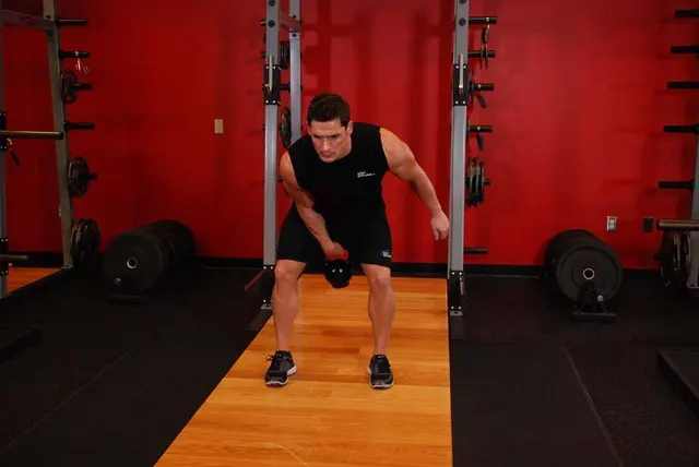 One-Arm Kettlebell Clean, finishing position