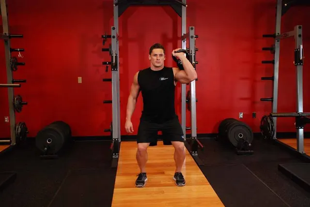 One-Arm Kettlebell Push Press, finishing position