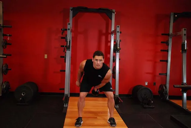 One-Arm Kettlebell Swings, finishing position
