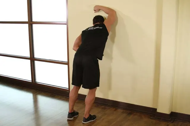 One Arm Against Wall, starting position