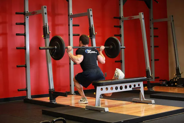 One Leg Barbell Squat, finishing position