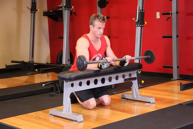 Palms-Down Wrist Curl Over A Bench, finishing position