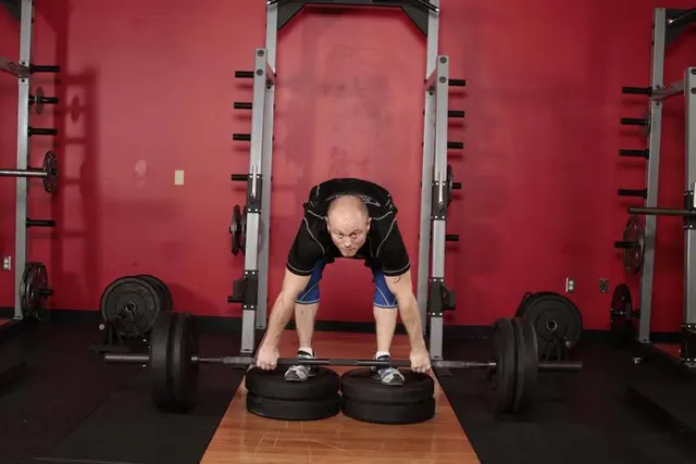 Romanian Deadlift from Deficit, finishing position