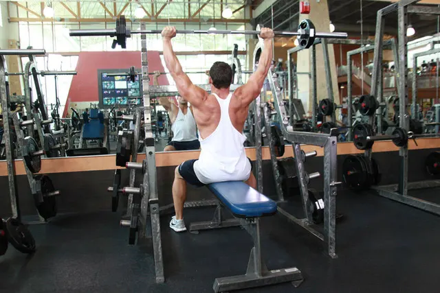 Seated Barbell Military Press, finishing position