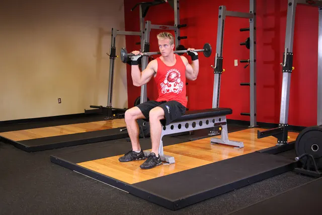 Seated Barbell Twist, finishing position