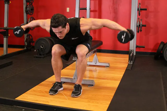 Seated Bent-Over Rear Delt Raise, finishing position