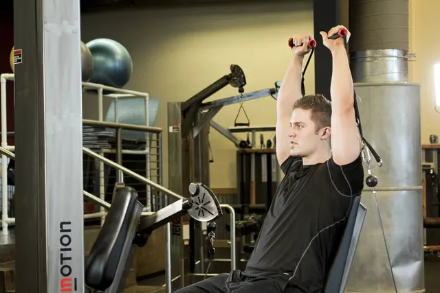 Seated Cable Shoulder Press, finishing position