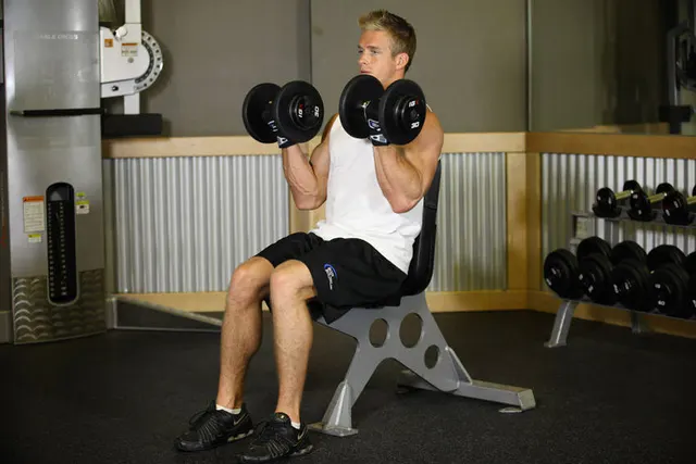 Seated Dumbbell Curl, finishing position
