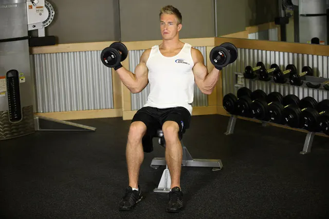 Seated Dumbbell Inner Biceps Curl, finishing position