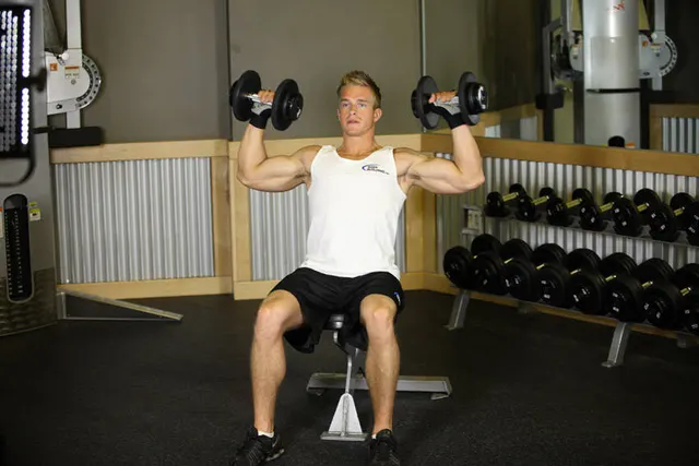Seated Dumbbell Press, finishing position