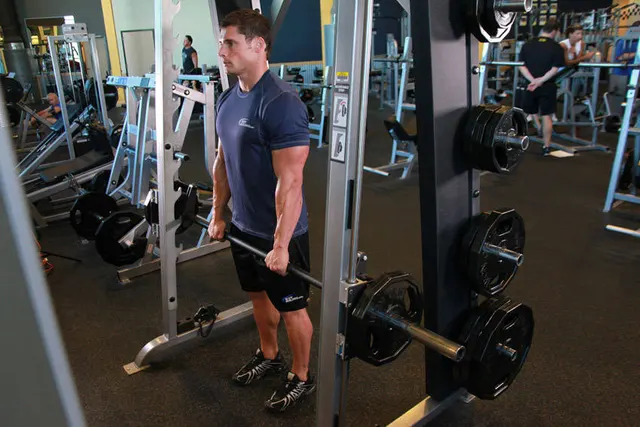 Smith Machine Stiff-Legged Deadlift, finishing position