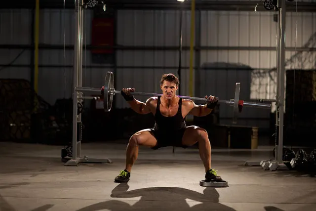 Squat with Plate Movers, finishing position