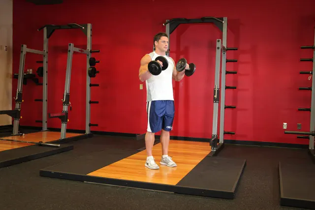 Standing Dumbbell Reverse Curl, finishing position