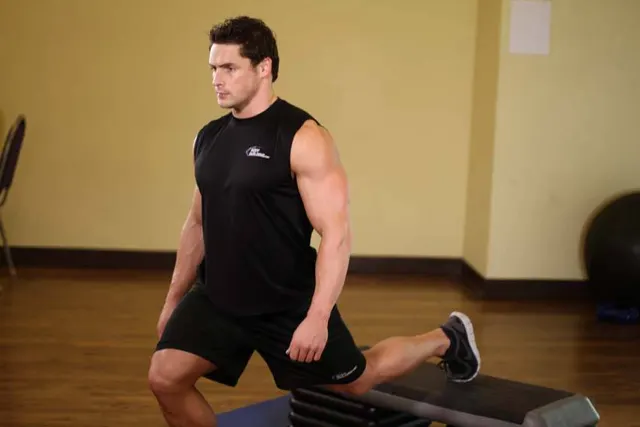 Standing Elevated Quad Stretch, finishing position