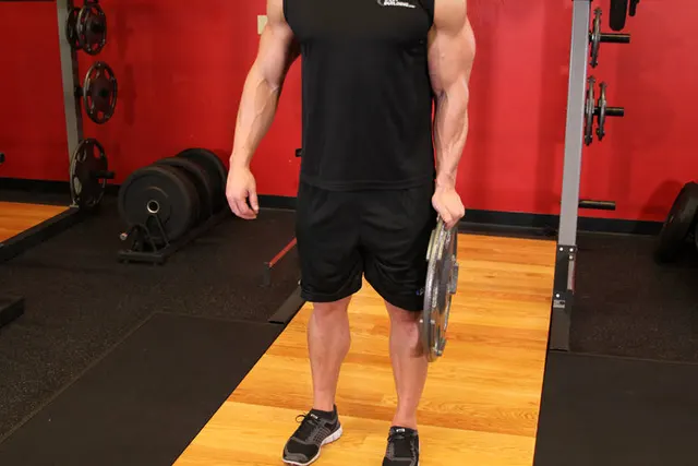 Standing Olympic Plate Hand Squeeze, finishing position