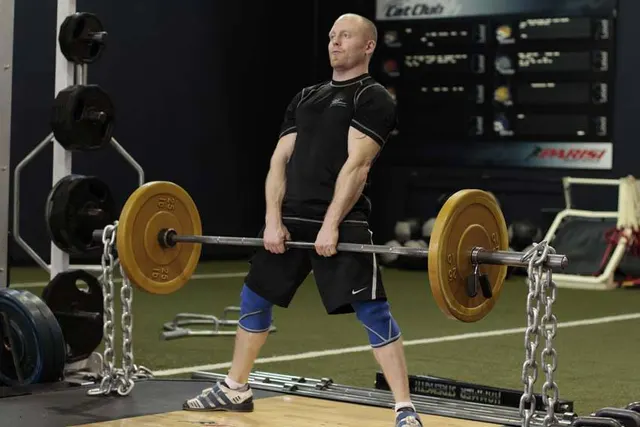 Sumo Deadlift with Chains, finishing position