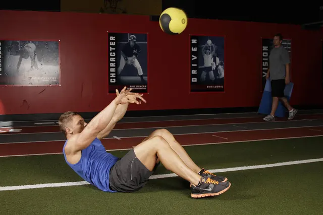 Supine Two-Arm Overhead Throw, finishing position