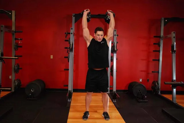 Two-Arm Kettlebell Military Press, finishing position