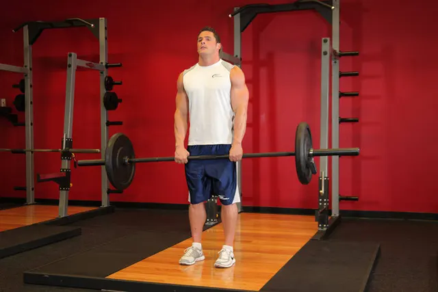 Upright Barbell Row, finishing position