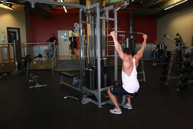 Wide-Grip Pulldown Behind The Neck, finishing position